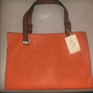 Retro style orange purse with gold hardware